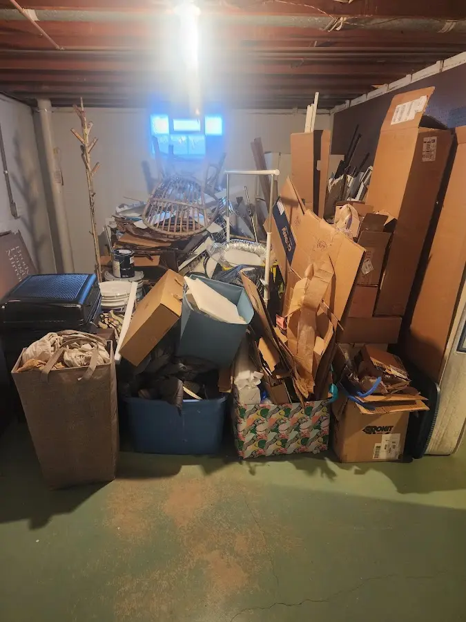 Roll-off dumpster container at job site for 2 Yard Dumpster Rental in Marcellus